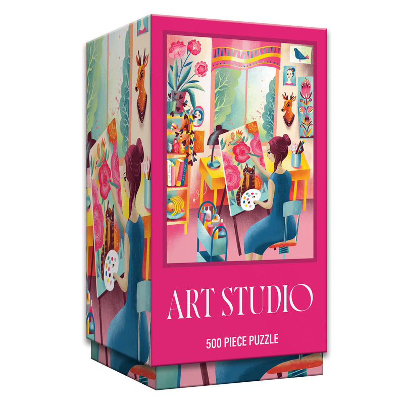 A vibrant box labeled "ROSEART - VERTICAL VISIONS - ART STUDIO - 500 PIECE JIGSAW PUZZLE" shows an illustrated art studio scene with a woman painting at her desk.