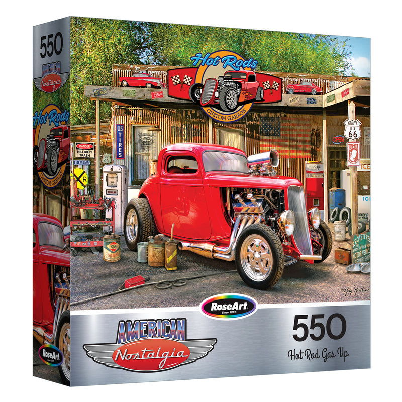 The ROSEART - AMERICAN NOSTALGIA - HOT ROD GAS UP 550-piece jigsaw puzzle showcases a red hot rod at a vintage gas station with retro signs and tools, capturing classic American nostalgia.