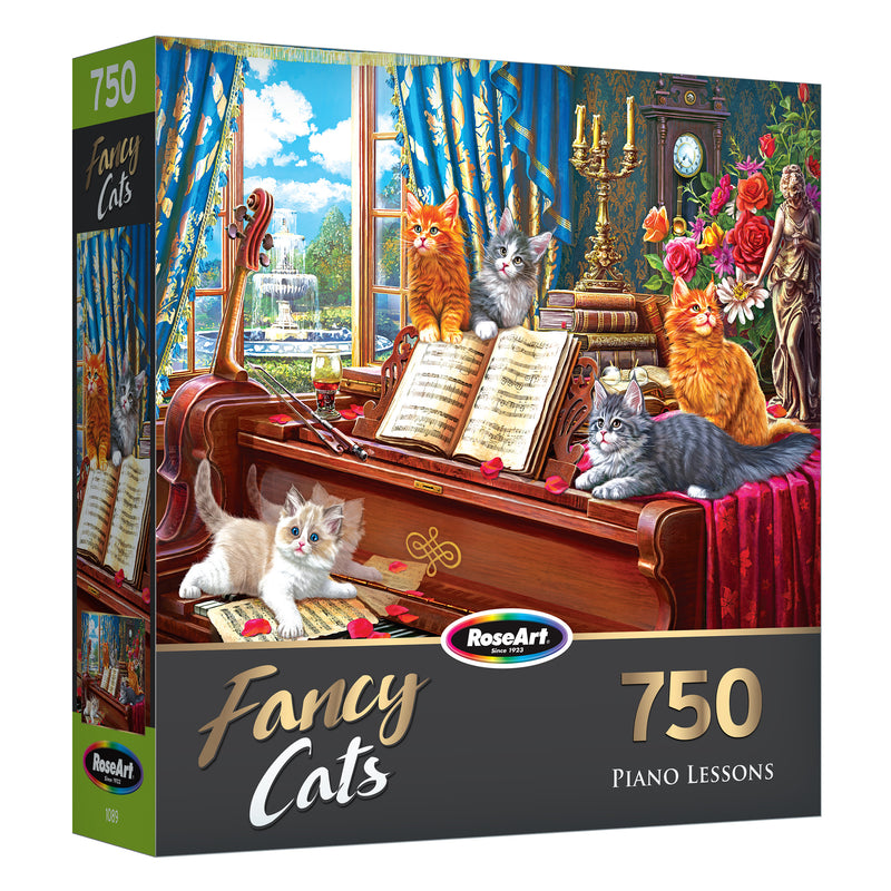 A 750-piece puzzle titled "RoseArt - Fancy Cats - Piano Lessons - 750 Piece Jigsaw Puzzle" by RoseArt, featuring colorful cats sitting on and around a piano with sheet music, flowers, and a picturesque garden visible through the window.