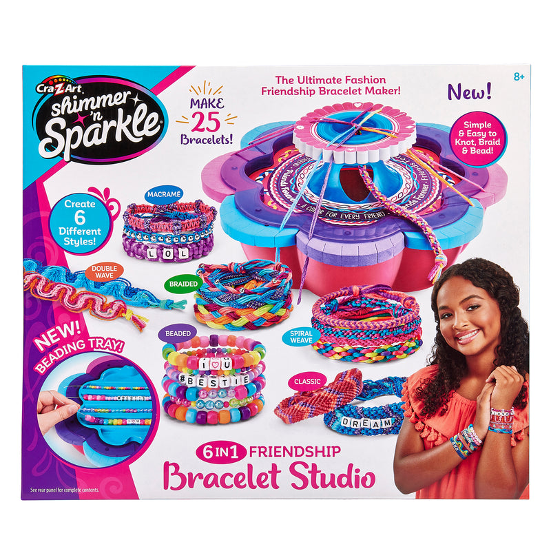 Box cover of a Shimmer 'n Sparkle 6 in 1 Friendship Bracelet Studio showing a girl wearing several colorful bracelets, and the bracelet making tool. The text highlights its ability to create 25 bracelets with 6 different styles.