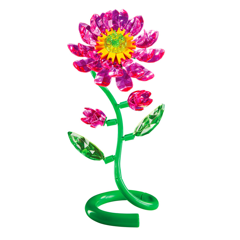 The Crystal Gem Creations Blooming Lotus is a vibrant sculpture featuring a green stem, pink petals, and yellow center. It stands elegantly on a spiral base, capturing the essence of a blooming lotus in every gleaming detail.