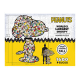 Image of a puzzle box labeled "RoseArt-Peanuts-World's Largest Snoopy-1600 Piece Jigsaw Puzzle" containing 1600 pieces. Dimensions are 53.1 inches tall and 40.8 inches wide. The completed puzzle is shown beside a height chart.
