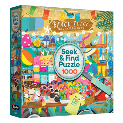 The ROSEART Seek & Find Beach Souvenir Shop 1000-piece jigsaw puzzle features a vibrant beach shop scene with various items and decorations. The RoseArt logo is displayed on the lower left of the box.