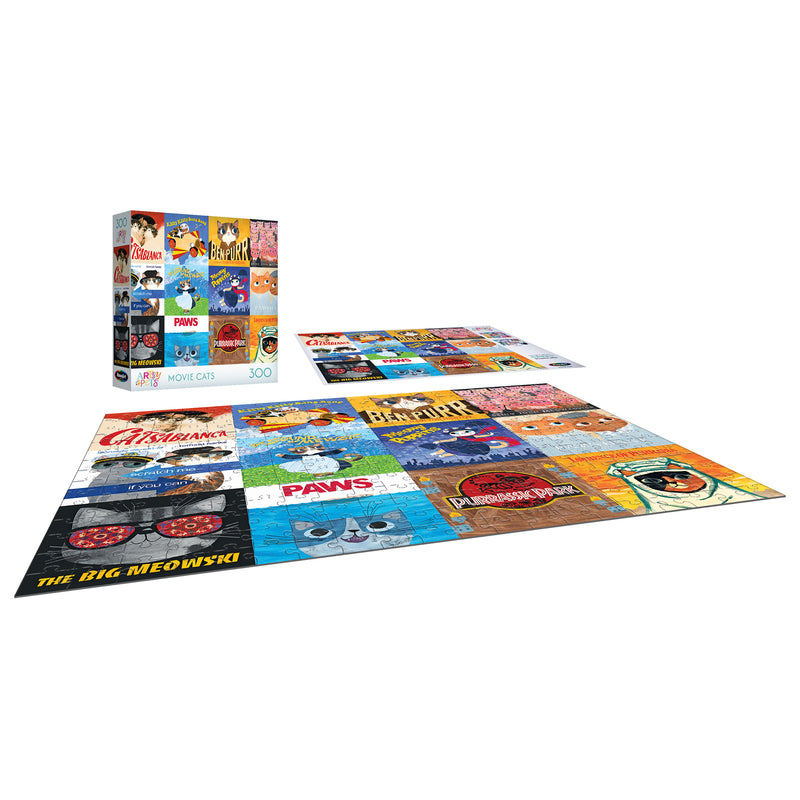 A completed ROSEART-PLANET CAT-MOVIE CATS-300 PIECE JIGSAW PUZZLE, featuring illustrated cat-themed movie poster parodies, sits beside its vibrant RoseArt box.