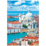 Enjoy piecing together the ROSEART-KODAK CAMERA TO CANVAS-VENICE-500 PIECE JIGSAW PUZZLE, featuring an aerial view of the Basilica di Santa Maria della Salute surrounded by red-roofed Venice and turquoise waters under a partly cloudy sky.
