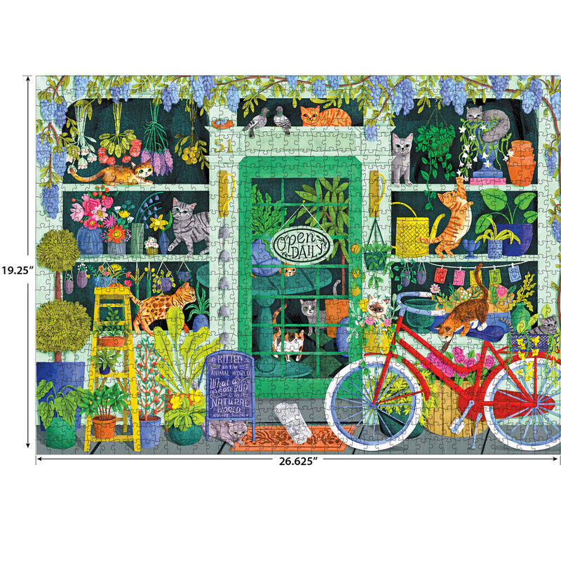 A colorful storefront displays plants, flowers, and cats among the items. A red bicycle is parked in front, and a "Open Daily" sign hangs on the door. The dimensions are 19.25" x 26.625". This scene comes to life in the RoseArt-Soft Touch-Cat Flowers-1000 Piece Jigsaw Puzzle.
