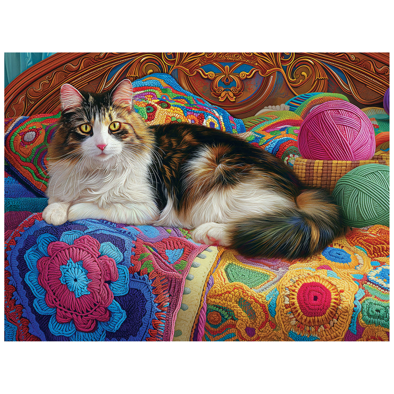 A fluffy cat relaxes on a colorful quilt with yarn balls, similar to the serene scene in the ROSEART KODAK PREMIUM KNITTING KITTEN 300-PIECE JIGSAW PUZZLE.