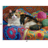 The ROSEART - KODAK PREMIUM 300-piece jigsaw puzzle features a multicolored knitting kitten on a vibrant crochet blanket with yarn balls, measuring 18x24 inches.
