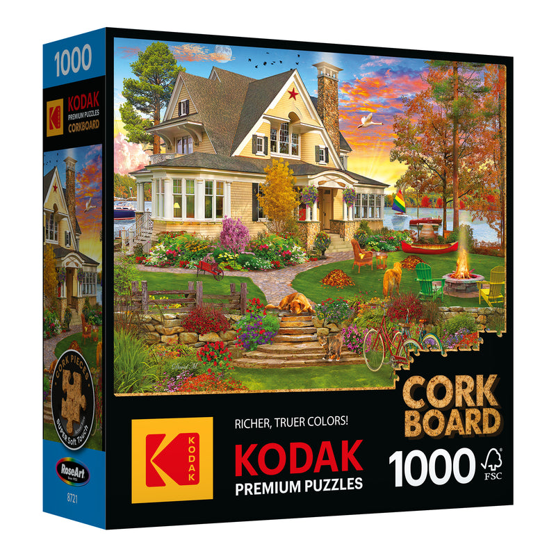 Assemble the ROSEART - KODAK PREMIUM CORK- LAKESIDE HOME 1000-piece jigsaw puzzle, showcasing a vibrant outdoor scene with a charming house, lush garden, and lounging dog. Crafted from premium cork for durability and easy handling.