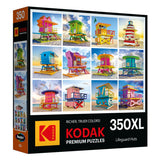 Puzzle box featuring colorful lifeguard huts designs, titled "RoseArt - Kodak Premium - Lifeguard Huts," consisting of 350 pieces.