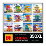 The RoseArt - Kodak Premium - Lifeguard Huts 350-piece jigsaw puzzle features a vibrant box design showcasing colorful lifeguard huts arranged in a captivating grid layout.