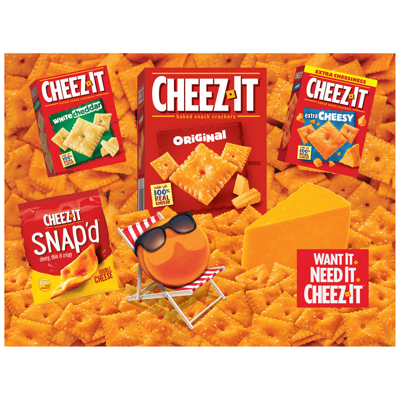 The ROSEART 500-Piece Cheez-It Snack Assortment Jigsaw Puzzle features original, white cheddar, extra cheesy, and Snap'd Cheez-Its with a cheese wedge and an orange ball in sunglasses on a chair, perfect for puzzlers who love snacks.