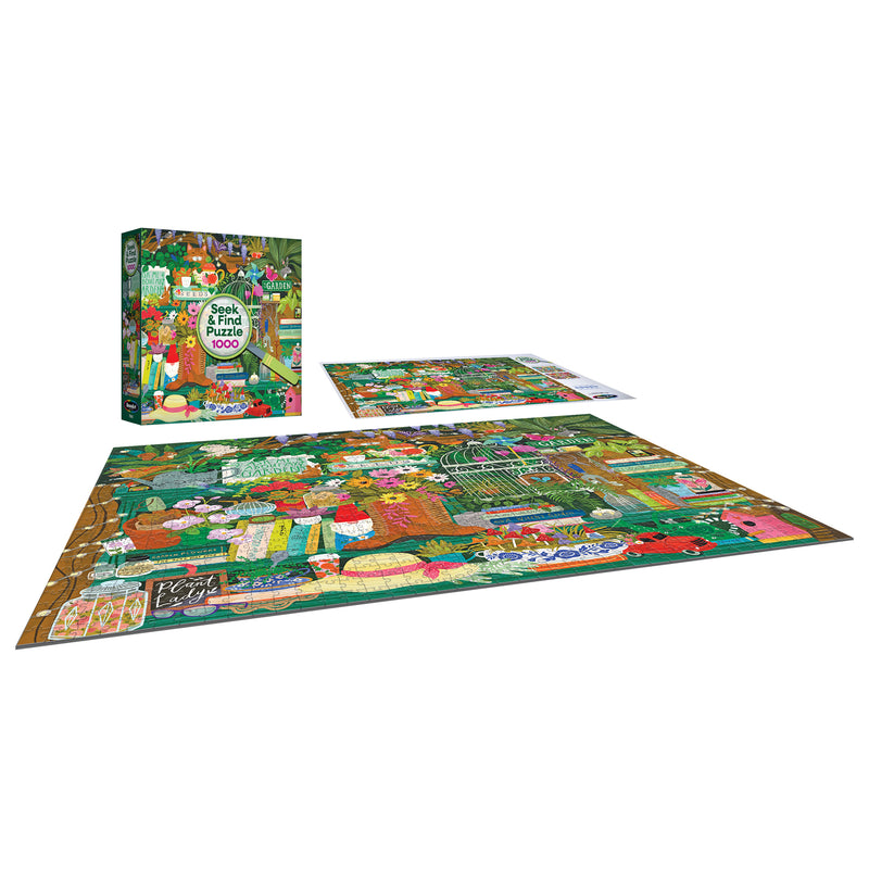 The completed ROSEART - SEEK & FIND - GARDENER'S LIBRARY 1000 piece jigsaw puzzle, featuring a vibrant garden scene, is displayed with its box and reference sheet—a stunning gift for any gardening enthusiast.