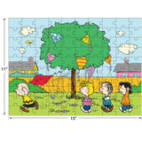 RoseArt - Peanuts - Cometa en el árbol - Rompecabezas de 100 piezas