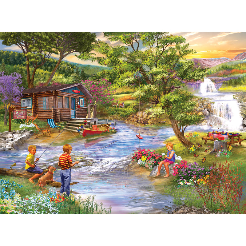 Three children and a dog by a stream near a log cabin. One child is fishing, two are playing near a garden, and picnic table is set up nearby. A waterfall and mountains are in the background. This scene can be experienced through the RoseArt - Chris Bigelow - Fishing from the Banks - 1000 Piece Jigsaw Puzzle.