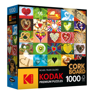 RoseArt - Kodak Cork - Love is Everywhere - 1000 Piece Jigsaw Puzzle box featuring various colorful heart images on a cork board background, with a "1000" piece count and an included puzzle poster.