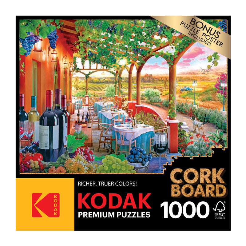 Box for a 1000-piece RoseArt - Kodak Cork - Wine Country - 1000 Piece Jigsaw Puzzle, featuring an outdoor dining scene with wine bottles, grapes, and a scenic vineyard in the background.
