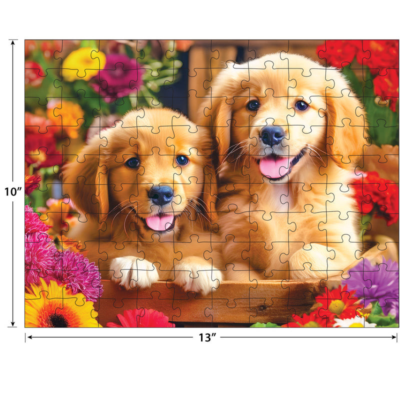Two Golden Puppy Pals with open mouths sit in a basket among colorful flowers on this ROSEART KODAK PREMIUM GOLDEN PUPPY PALS 100-piece jigsaw puzzle, measuring 10 x 13 inches.