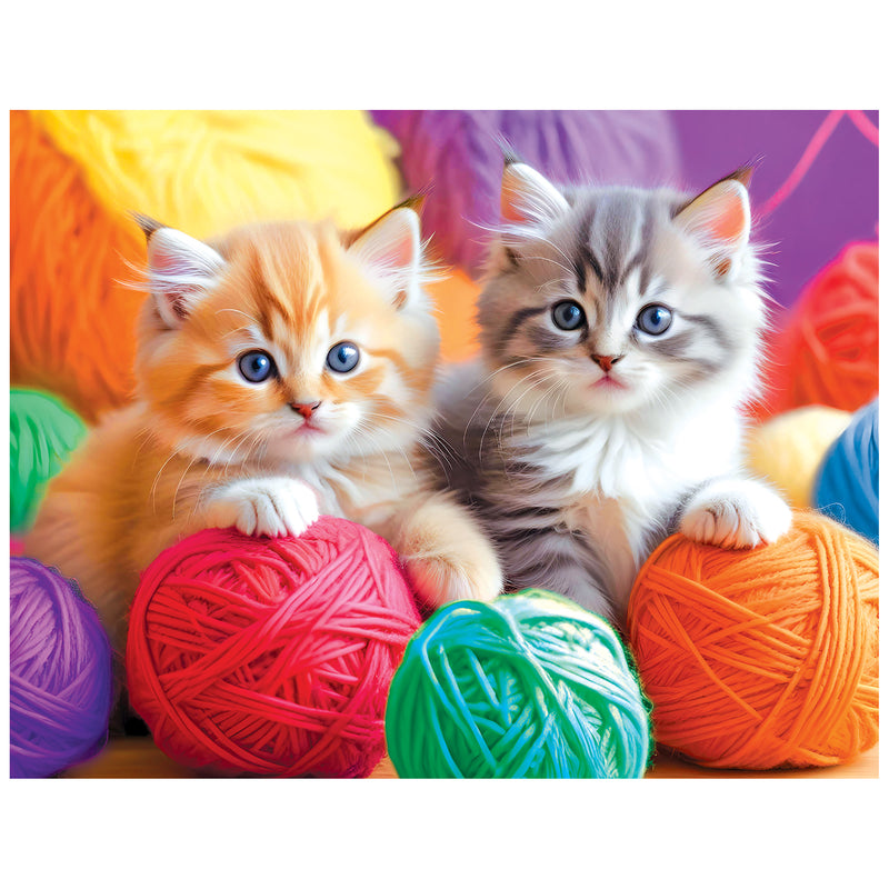 Two kittens—one orange, one gray—play with fuzzy yarn balls in this charming scene, featured on the ROSEART KODAK PREMIUM "Fuzzy Yarn Balls" 100-piece jigsaw puzzle.