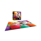 A completed ROSEART KODAK Premium Fuzzy Yarn Balls 100-piece jigsaw puzzle shows two kittens among yarn balls, with the puzzle box in the background.