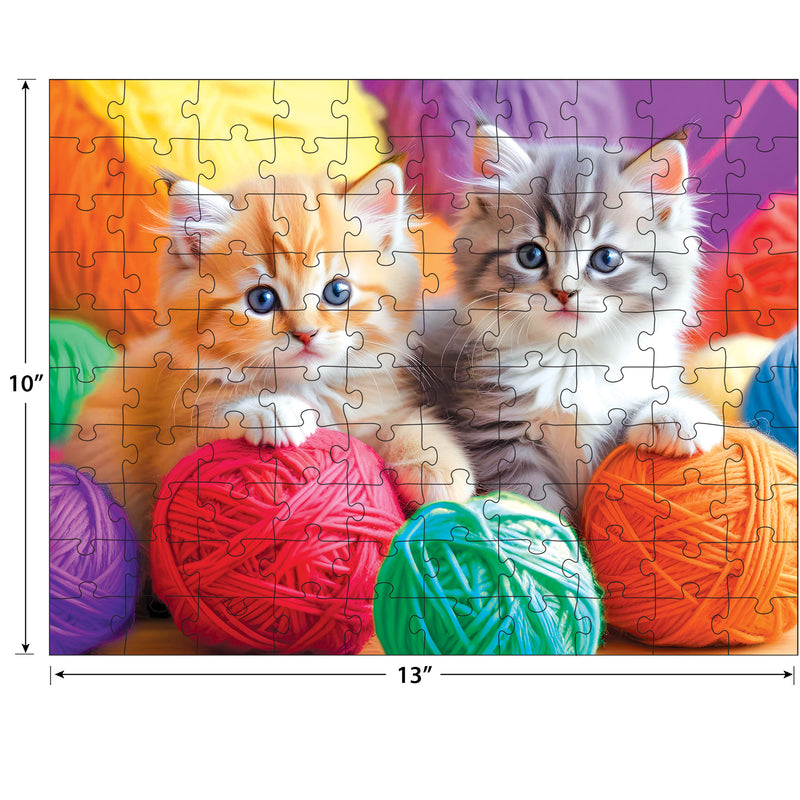 The ROSEART KODAK PREMIUM Fuzzy Yarn Balls 100-piece jigsaw puzzle (10 x 13 in) features two kittens nestled among colorful fuzzy yarn balls.