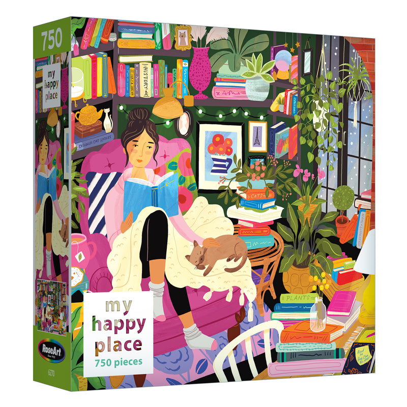 Dive into tranquility with the RoseArt My Happy Place Reading Nook Puzzle. This 750-piece jigsaw illustrates a cozy scene of a woman reading among plants, books, and a sleeping cat—perfect for your escape to comfort!.
