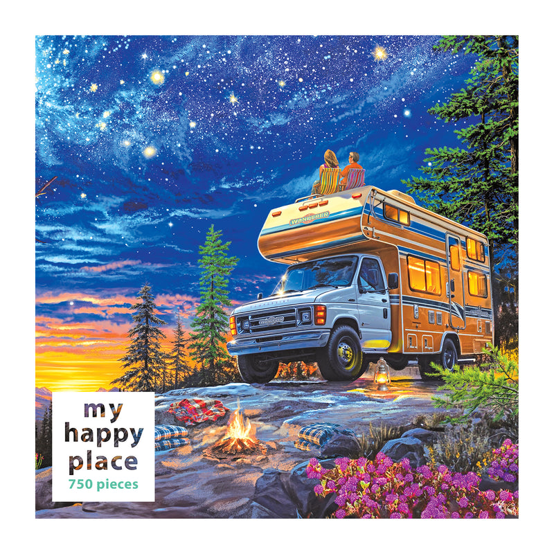 Two people relax on a camper van by a cliff, amidst trees and flowers beneath the stars. A campfire and colorful blankets lie nearby. The ROSEART jigsaw puzzle box says "MY HAPPY PLACE - CAMPER NIGHT - 750 PIECE.