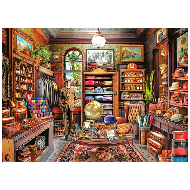 The ROSEART KODAK Premium Vintage Haberdashery 1000-piece jigsaw puzzle showcases a suit-clad mannequin, neatly arranged clothes, hats, vibrant ties, leather bags, a globe, wall art under intricate woodwork and an elegant central chandelier.