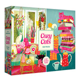 The ROSEART Double Sided Cozy Cats 500 Piece Jigsaw Puzzle features vibrant illustrations of cats, books, plants, and a teapot in a cozy room setting.
