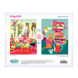 Back of ROSEART DOUBLE SIDED COZY CATS 500 PIECE JIGSAW PUZZLE box: two cozy cats—one among plants, one with books and a cup. Double-sided puzzle offers twice the feline fun!.