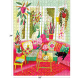 Relax with the ROSEART Double Sided Cozy Cats 500 Piece Jigsaw Puzzle (24" x 18"), featuring a vibrant, plant-filled living room, patterned furniture, and adorable cats—a white one on a chair and a black one on the sofa.