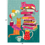 The ROSEART DOUBLE SIDED COZY CATS 500 piece jigsaw puzzle features cozy cats, books, a red polka-dot teapot, and steaming mug in a colorful illustration. Finished size: 24 x 18 inches.