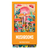 The ROSEART - VERTICAL VISIONS - MUSHROOMS 500 piece jigsaw puzzle box shows illustrated mushrooms and plants, with "500 Piece Puzzle" displayed beneath the image on an orange background.