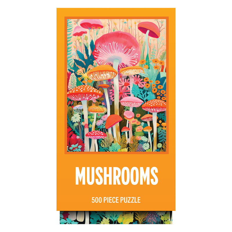 The ROSEART - VERTICAL VISIONS - MUSHROOMS 500 piece jigsaw puzzle box shows illustrated mushrooms and plants, with "500 Piece Puzzle" displayed beneath the image on an orange background.