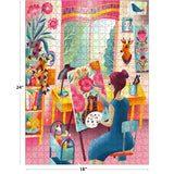 In a lively art studio, a woman in blue paints flowers and a cat. Surrounded by plants, shelves, and wall art, this ROSEART Vertical Visions Art Studio 500-piece jigsaw puzzle measures 24 x 18 inches.