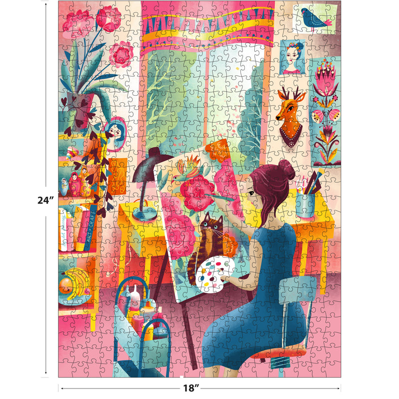 In a lively art studio, a woman in blue paints flowers and a cat. Surrounded by plants, shelves, and wall art, this ROSEART Vertical Visions Art Studio 500-piece jigsaw puzzle measures 24 x 18 inches.