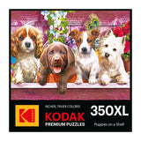 The ROSEART Kodak Premium 350-piece jigsaw puzzle features a box cover with four adorable puppies on a shelf set against a vibrant floral backdrop.
