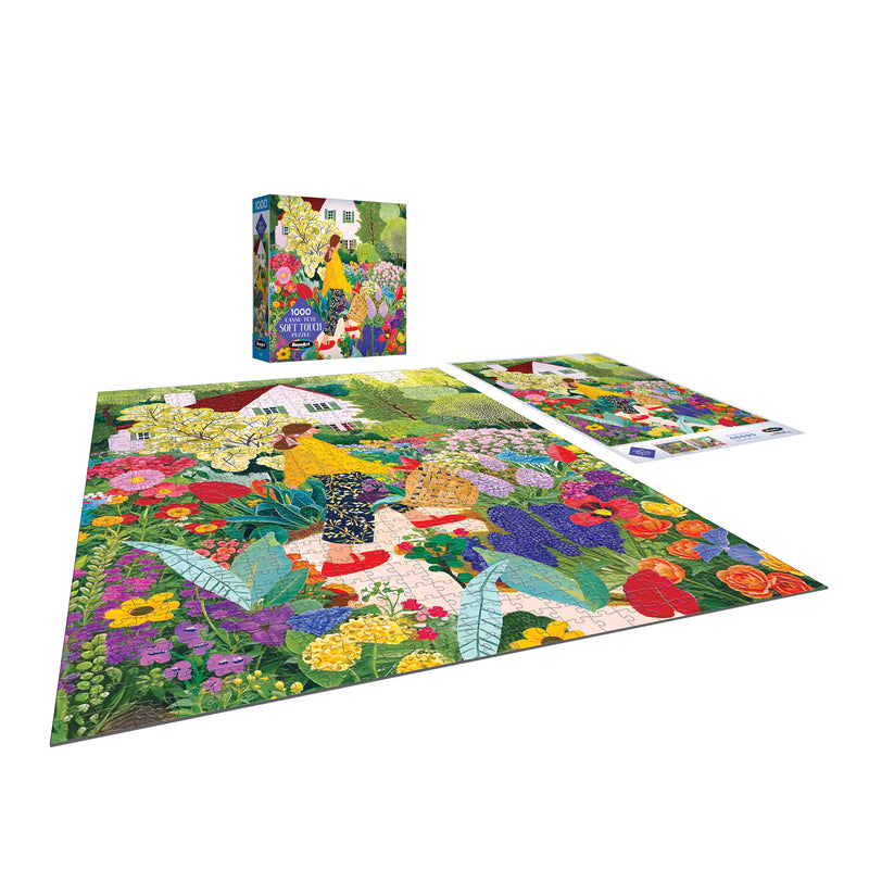 The ROSEART Soft Touch "Picking Flowers" 1000-piece jigsaw puzzle features a colorful garden scene with flowers and comes partially assembled beside its box and reference poster.