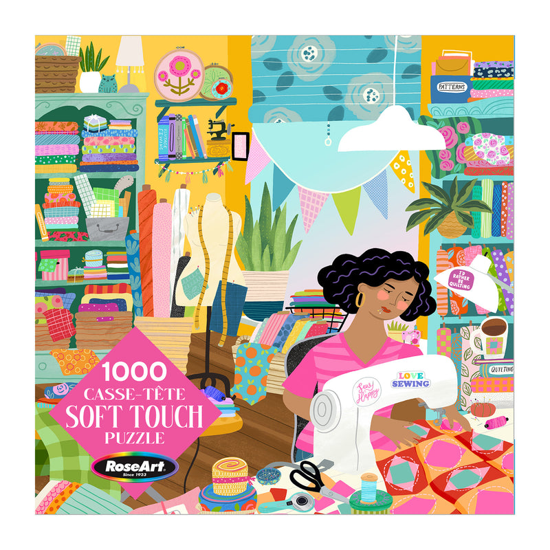 A woman sews a colorful quilt in a bright, fabric-filled room on the ROSEART Soft Touch Sewing Room 1000 Piece Jigsaw Puzzle.
