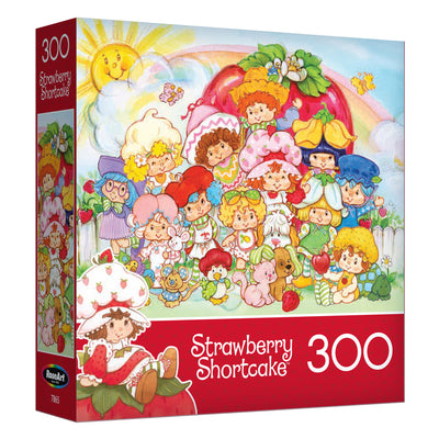 The ROSEART STRAWBERRY SHORTCAKE AND FRIENDS 300-piece jigsaw puzzle features colorful cartoon characters with a big strawberry and rainbow in the background.