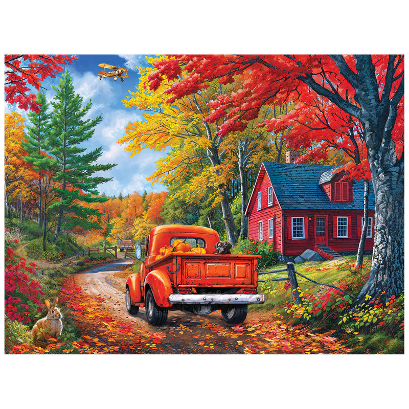 A red truck passes a red house on a Maine road lined with autumn trees, as a rabbit sits roadside and a yellow biplane flies above—captured in the ROSEART KODAK PREMIUM MAINE ROAD 350 PIECE JIGSAW PUZZLE.