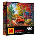 Assemble the ROSEART KODAK PREMIUM MAINE ROAD 350 PIECE JIGSAW PUZZLE, showcasing an autumn country road with a red truck, red houses, vibrant trees, a dog, and a squirrel in a charming Maine scene.