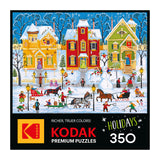 Festive winter village scene with ice skating and snowmen, featured on the ROSEART KODAK Premium "After the Snow Falls" 350-piece jigsaw puzzle, holiday edition.