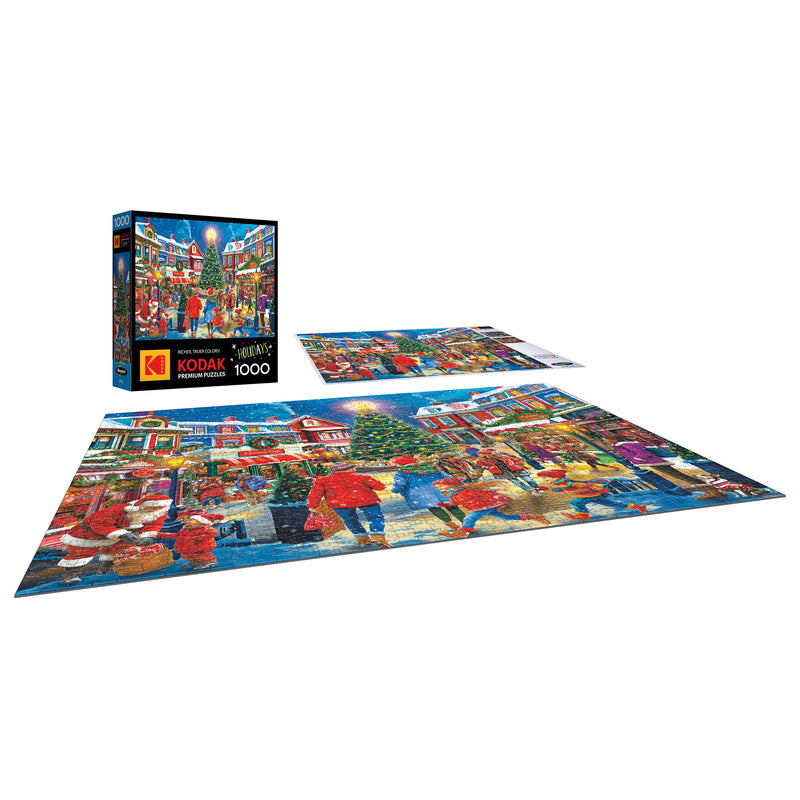 The ROSEART KODAK PREMIUM Christmas Village 1000-piece jigsaw puzzle features a festive holiday street scene and is displayed completed next to its box and a flat view of the charming image.