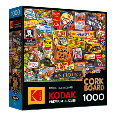 Box of a 1000-piece ROSEART - KODAK CORK - ANTIQUE SIGNS jigsaw puzzle, featuring nostalgic vintage advertising and antique sign imagery, perfect for fans of Kodak cork designs.