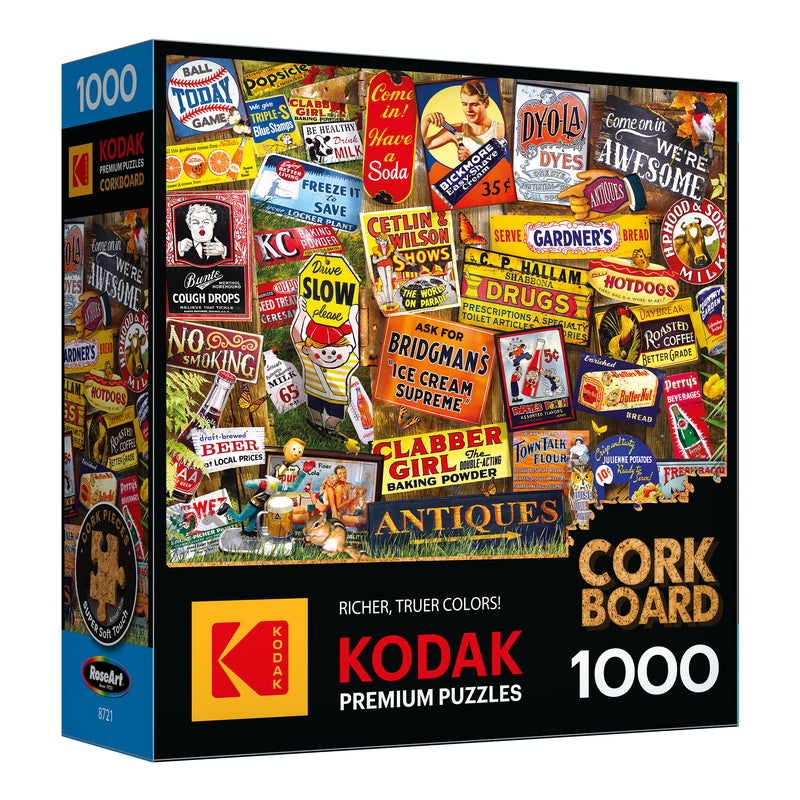 Box of a 1000-piece ROSEART - KODAK CORK - ANTIQUE SIGNS jigsaw puzzle, featuring nostalgic vintage advertising and antique sign imagery, perfect for fans of Kodak cork designs.