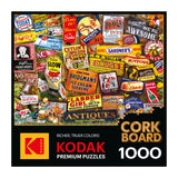 The ROSEART KODAK Cork Antique Signs 1000 Piece Jigsaw Puzzle features a collage of vintage signs and ads on a corkboard background, with Kodak branding and "1000 pieces" indicated at the bottom.