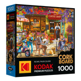 ROSEART - KODAK CORK - THE COFFEE SHOP 1000 Piece Jigsaw Puzzle features a lively coffee shop scene with people, a dog, and outdoor seating, all in a charming café setting with a unique cork board theme.