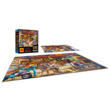 A completed ROSEART - KODAK CORK - THE COFFEE SHOP 1000 piece jigsaw puzzle is shown with its box and an unassembled section, highlighting a vibrant coffee shop street scene.