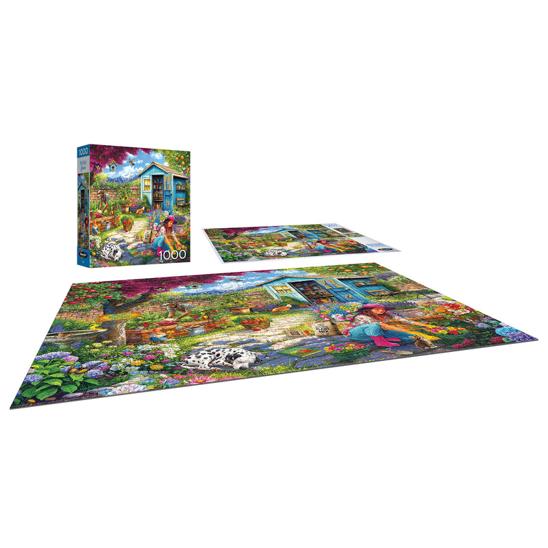 The ROSEART - HOBBY HAVEN - COUPLE IN THE GARDEN 1000 piece jigsaw puzzle displays a vibrant garden scene with a couple, dog, and blue house; image shows the puzzle box, pieces, and finished puzzle.